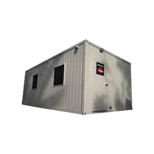 Exterior view of the Portacamp 18m² white modular unit, featuring a durable steel structure and secure door, designed for use as an industrial site office or camp accommodation.